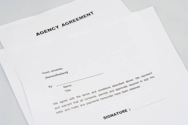 istock Agency contract form and fountain pen 1181039367
