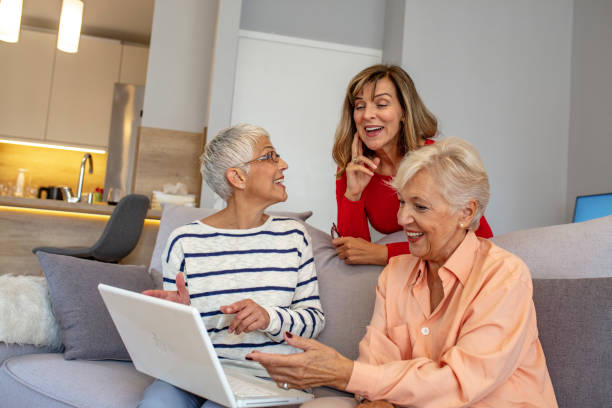 istock Senior friends using a laptop. 1181039619