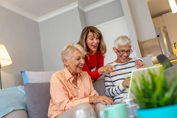 istock Senior friends using a laptop. 1181039620