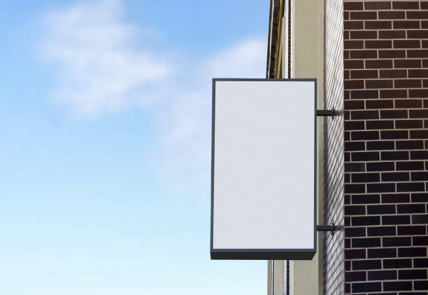 istock Blank white outdoor box mockup on brick wall, sky background 1181041332