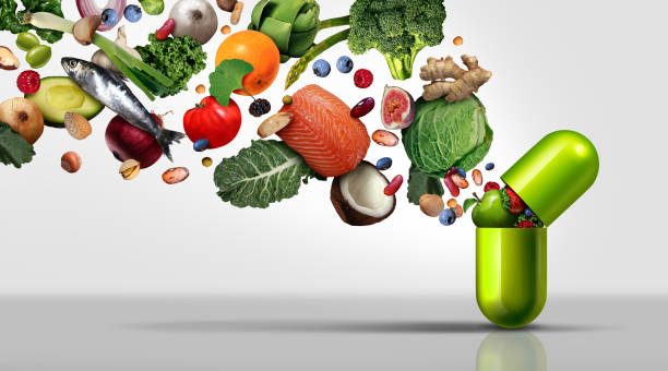 Nutritional Supplement Nutritional supplement and vitamin supplements as a capsule with fruit vegetables nuts and beans inside a nutrient pill as a natural medicine health treatment with 3D illustration elements. food supplements stock pictures, royalty-free photos & images