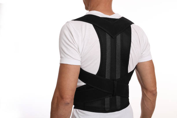 man with posture corrector. scoliosis, kyphosis treatment - human spine posture back backache imagens e fotografias de stock