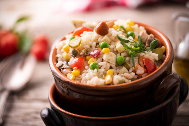 Delicious rice salad with vegetables stock photo
