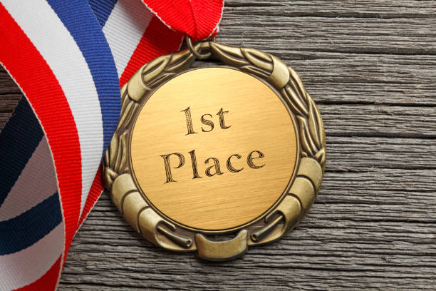 istock First Place Medal On Old Wooden Plank 1181052904