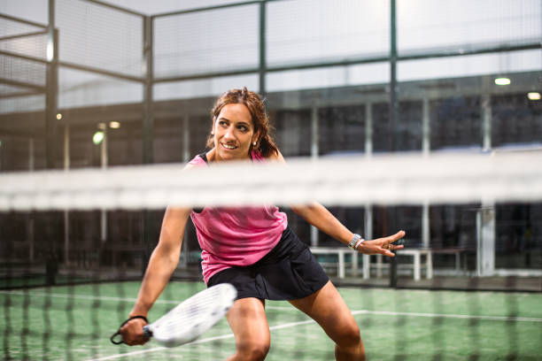 パデルを演奏する女性 - tennis indoors women court ストックフォトと画像