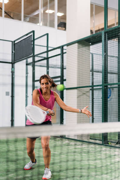 istock woman playing padel 1181055131
