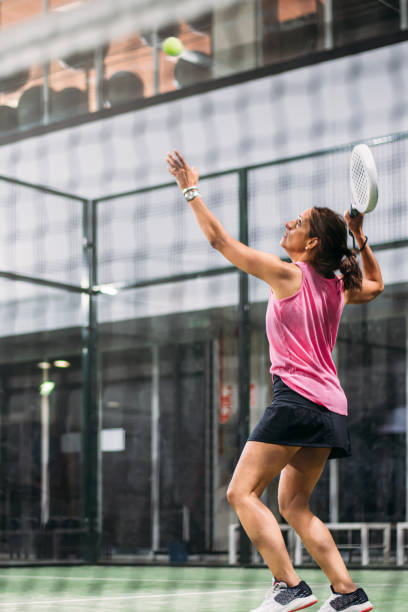 istock woman playing padel 1181055188