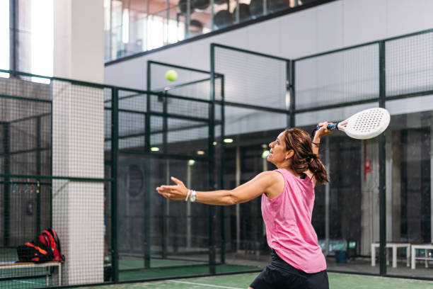 パデルを演奏する女性 - tennis indoors women court ストックフォトと画像