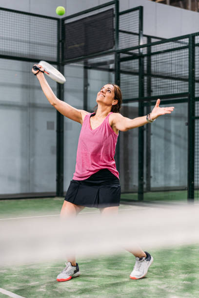 istock woman playing padel 1181055216