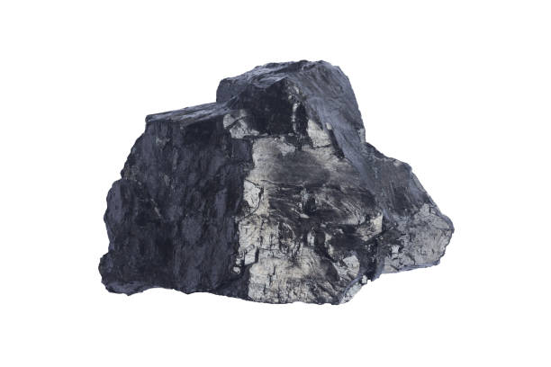 istock Black coal mine close-up with soft focus. Anthracite coal bar isolaned on white. Natural black coal bar for design. Industrial coal nugget close up 1181066750