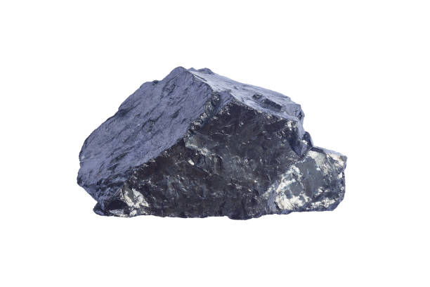 istock Black coal mine close-up with soft focus. Anthracite coal bar isolaned on white. Natural black coal bar for design. Industrial coal nugget close up 1181066763