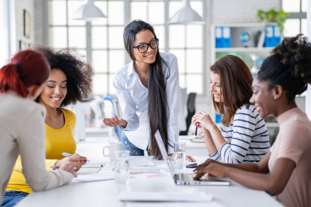 istock Multi-Ethnic women business team having discussion new projects 1181067994
