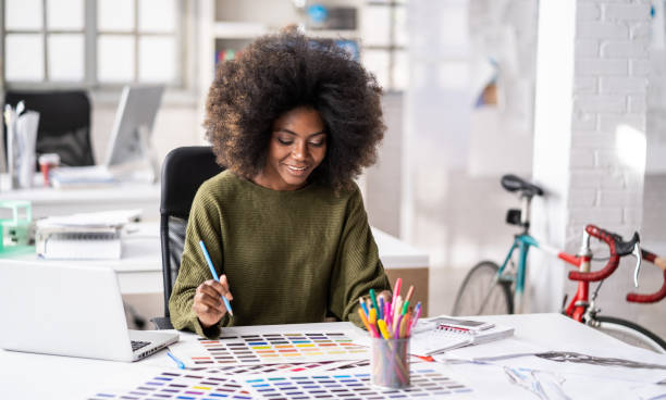istock African Fashion designer working in studio 1181068191