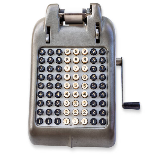 Vintage mechanical numeric calculator on white stock photo