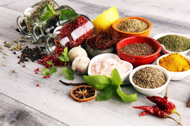 istock Spices and herbs on table. Food and cuisine ingredients with basil 1181078521