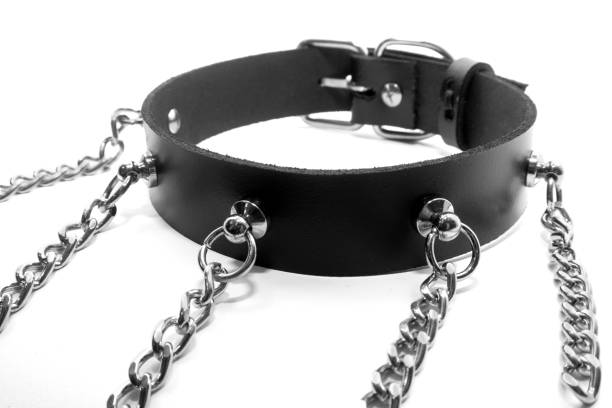 istock Black leather collar on a white background. Side view 1181079787