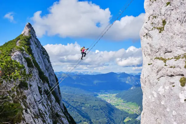 Photo of Via ferrata Donnerkogel Intersport via ferra in the Austrian Alps, near Gosau. Stairway to Heaven concept.