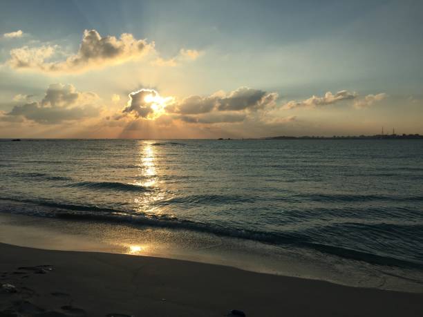istock beautiful sunrise on the beach 1181083912