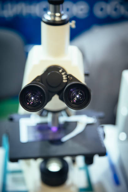 istock Ocular eyepiece lenses of binocular microscope, close up, selective focus 1181086493