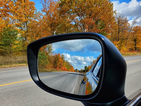 Fall colors in the side view mirror