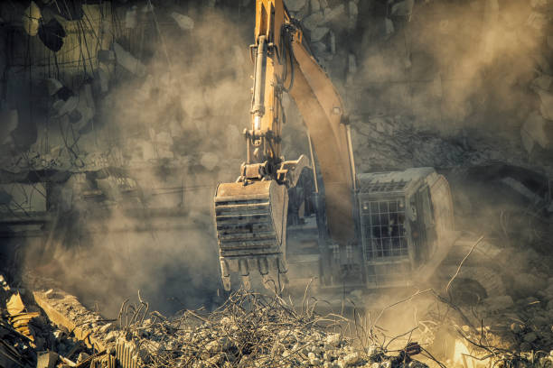 istock Machinery cleaning rubble 1181090762