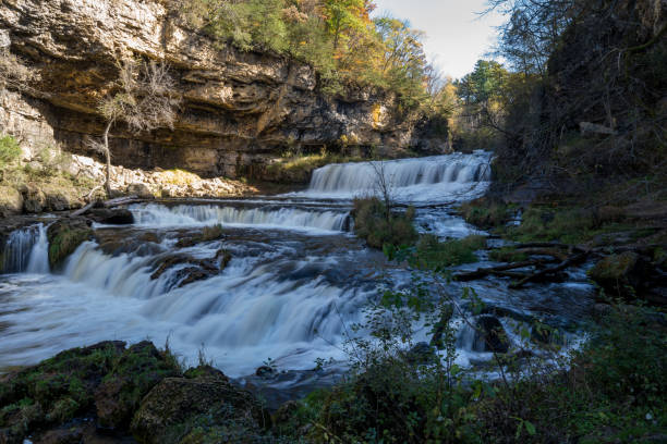 istock Waterfall at Willow River State Park in Hudson Wisconsin in fall.  Daytime long exposure 1181092063
