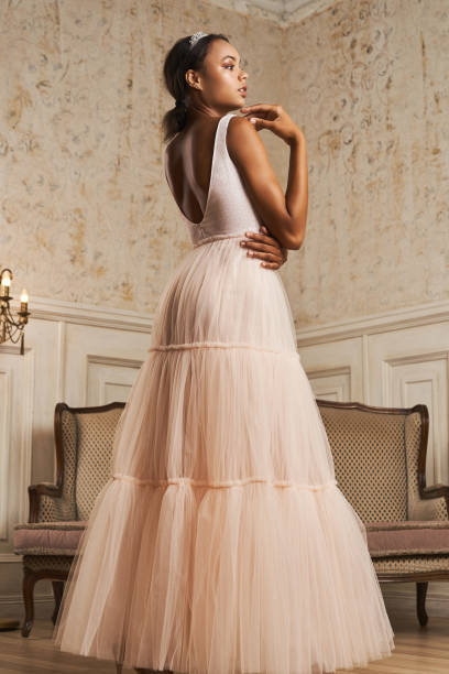 istock Dark-skinned bride posing in a wedding dress 1181092111