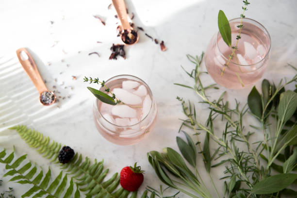 istock Pink cocktail on marble background 1181093584
