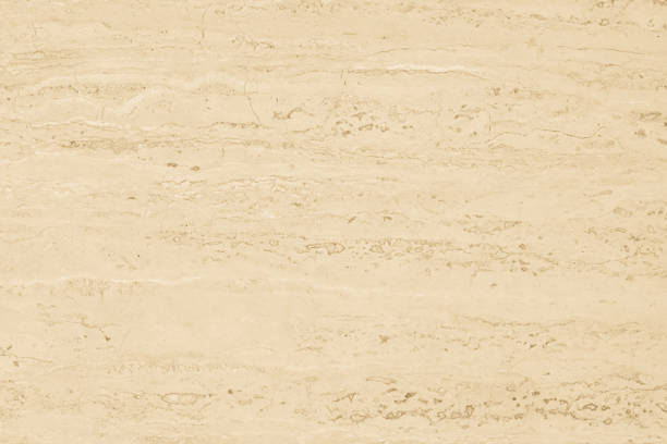 istock Marble limestone texture background in cream yellow 1181099335
