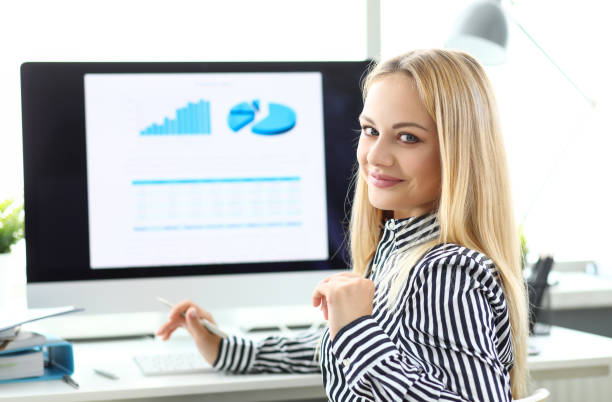istock Beautiful smiling clerk looking in camera portrait 1181099358