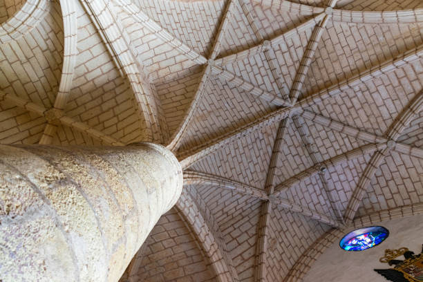 The ceiling vault with Gothic style warheads stock photo