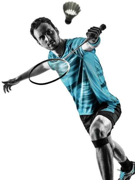 istock Badminton player man shadow silhouette isolated white background 1181107439