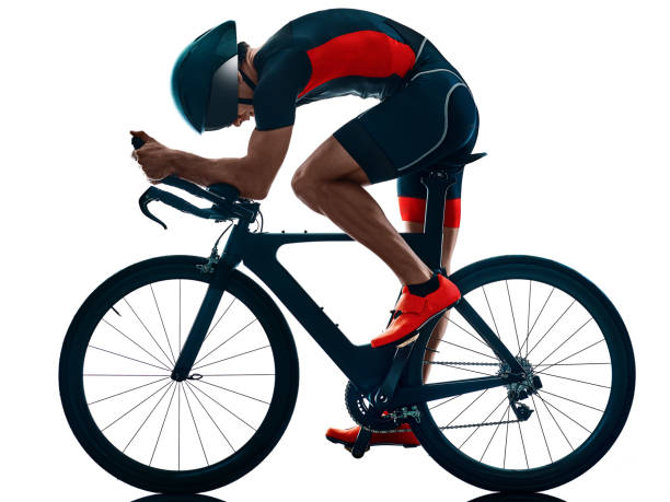 istock triathlete triathlon Cyclist cycling silhouette isolated white background 1181108182
