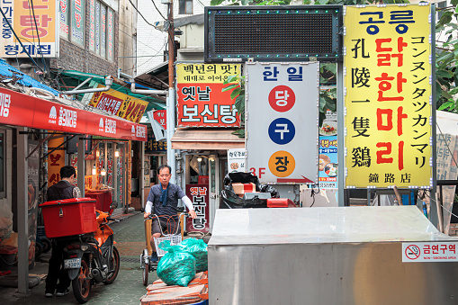 Seoul, South Korea - 30 July, 2019  : Street view in Dongdaemun district. Dongdaemun is a community full of young, underground culture. Cafes, galleries, and fashion wholesale.