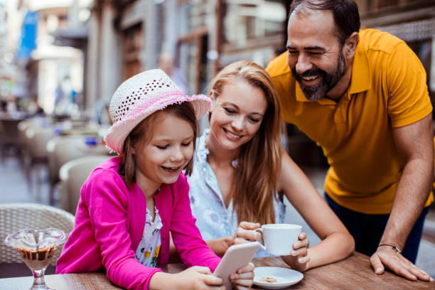 istock Family using a Phone 1181112922