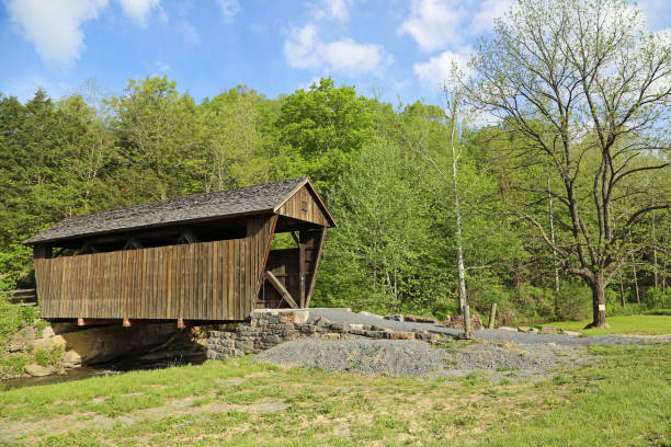 istock Covered bridge with trees -  Indian Creek covered bridge 1181115704