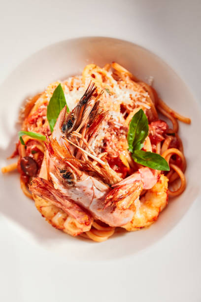 istock Shrimp linguine with smoked red pepper sauce 1181119232