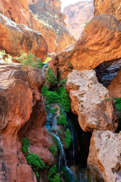 istock Elves Chasm waterfall with rim in background 1181122082