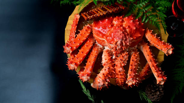 Red King Crab Japanese food on black table, selective focus. Red King Crab Japanese food on black table, selective focus. crab leg photos stock pictures, royalty-free photos & images