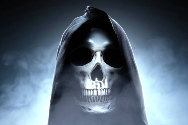 istock Human skull with a black cloak 1181124956