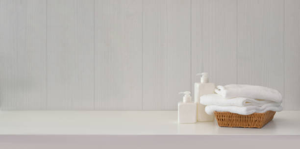 istock Towels with spa accessories on white table with copy space 1181134767