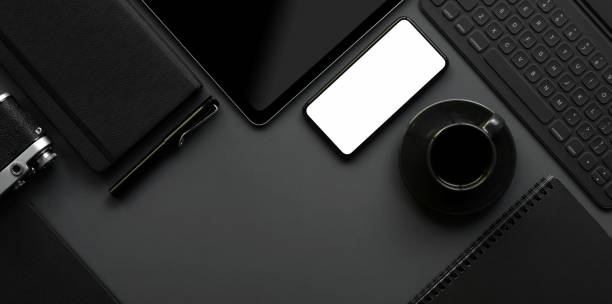 istock Overhead shot of dark modern workspace with copy space on grey background 1181134911
