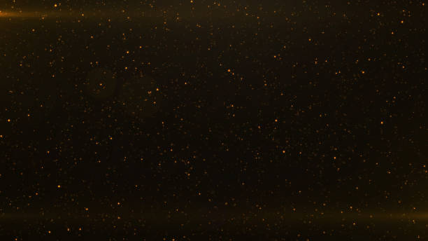 istock Abstract background of flickering gold particles and light flare 1181135193