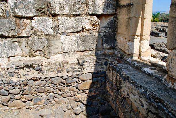 istock Ancient basalt foundation of Synagogue at Ancient Capernaum 1181138401