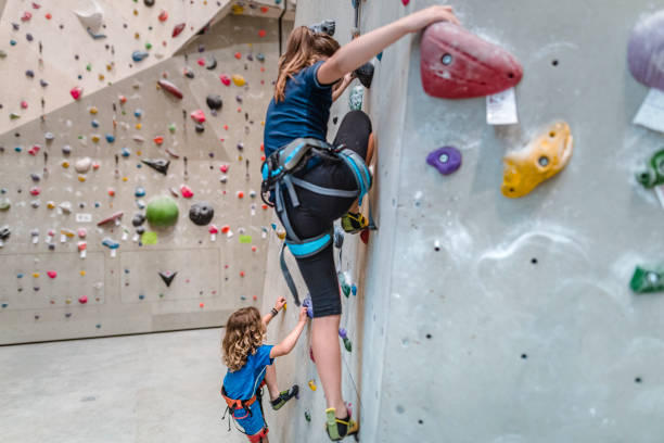 istock Kids climbing on climbing wall 1181140990