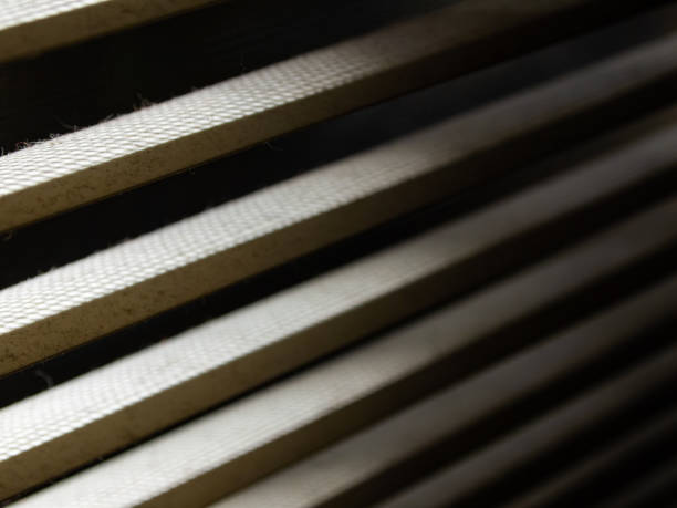 istock Blurred dust blinds inside a window, Blurred dust and Dirty mosquito wire screen window, Light & Shadow shot, Close up and macro shot, Selective focus 1181141235