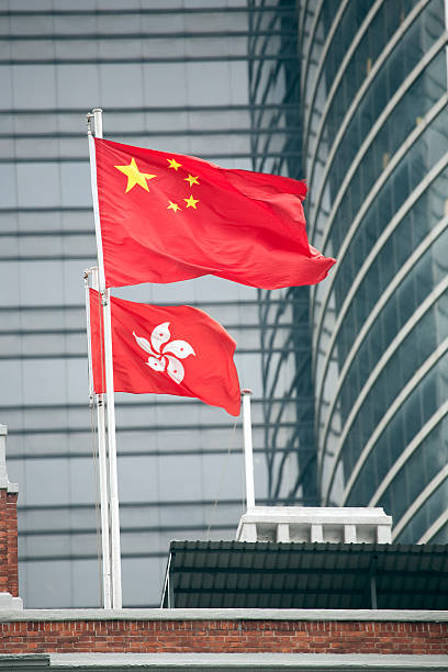istock Hong Kong and China Flags 118114273