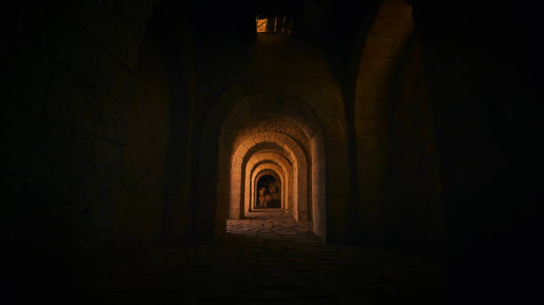 istock Dark arched corridor in the castle 1181145751