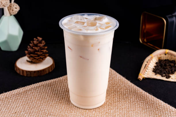 istock Fresh pressed frozen tea beverage in black background 1181145859