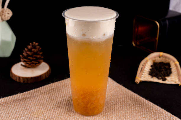 istock Fresh pressed frozen tea beverage in black background 1181145876